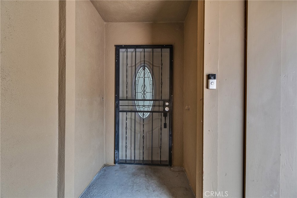 5121 Sierra Street Riverside, CA 92504 - Photo 9 of 34 a view of a wooden door