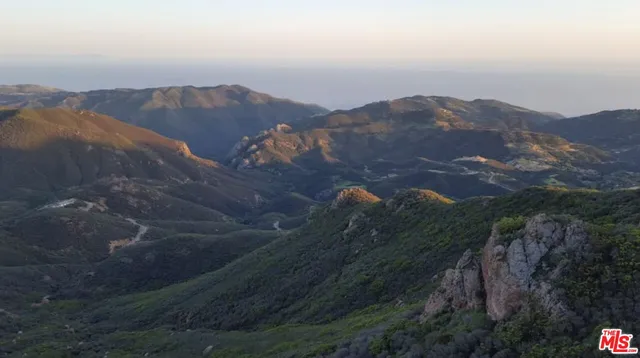 a view of city and mountain