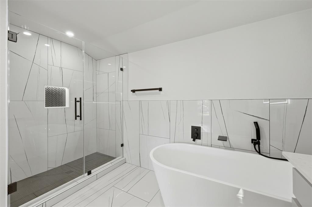 502 Madison Street Cleburne, TX 76033 - Photo 14 of 30 Primary Bath- New soaker tub and spacious walk-in-shower