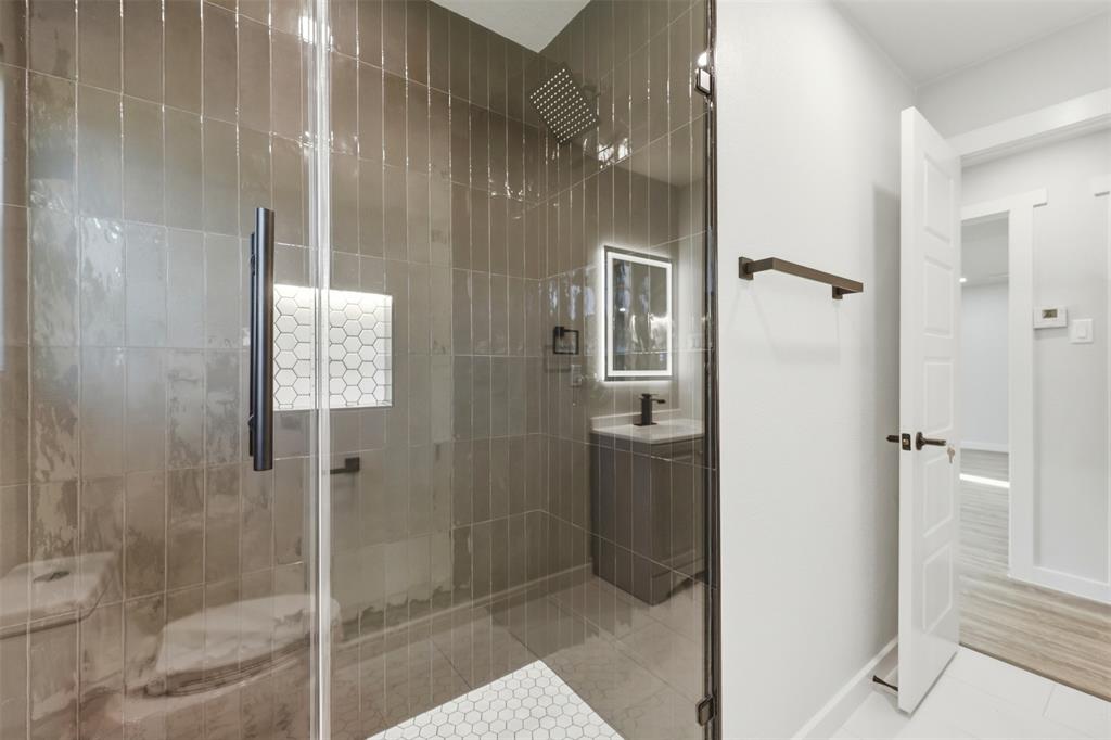 502 Madison Street Cleburne, TX 76033 - Photo 20 of 30 Beautifully tiled, brand new shower.