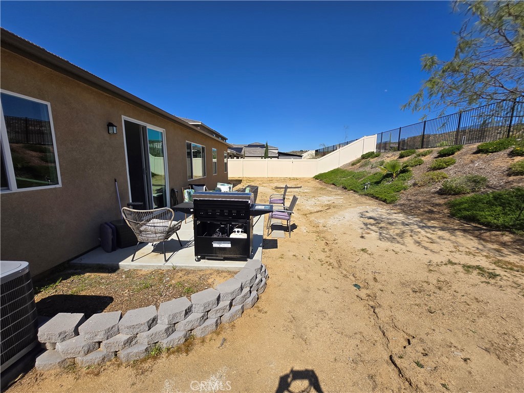 7900 Raincross Court Riverside, CA 92507 - Photo 20 of 21 a view of a backyard with sitting area