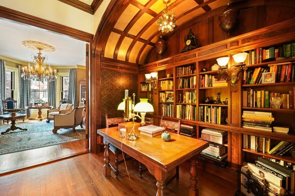 a view of a living room and dining room