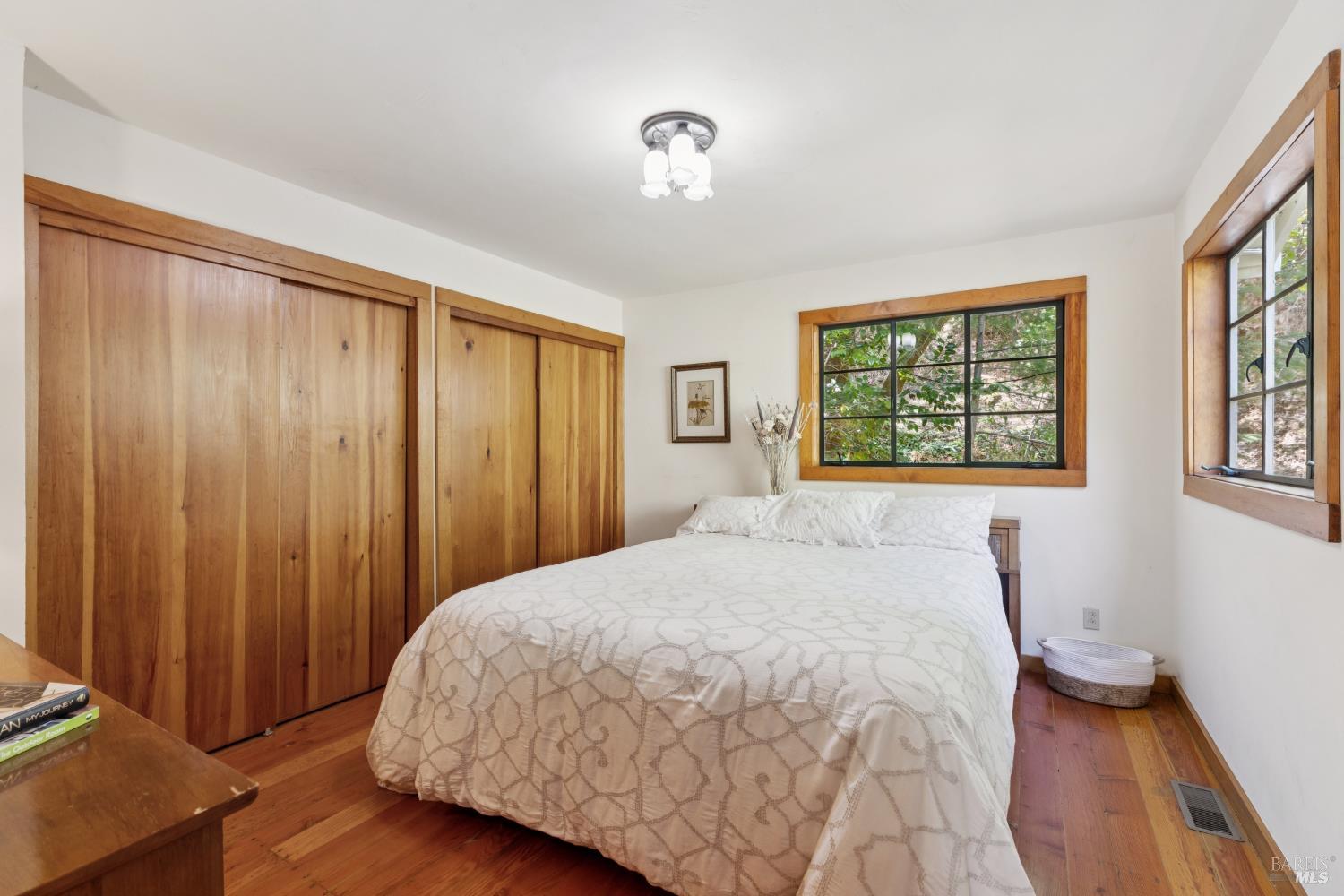 1311 West Dry Creek Road Healdsburg, CA 95448 - Photo 14 of 37 a spacious bedroom with a bed and a window