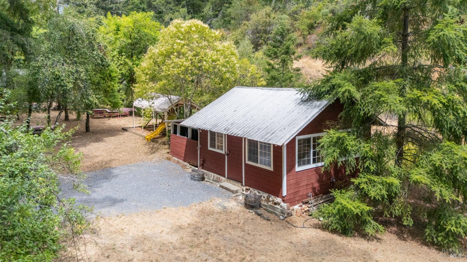 1311 West Dry Creek Road Healdsburg, CA 95448 - Photo 25 of 37 an aerial view of a house with yard and trees in the background