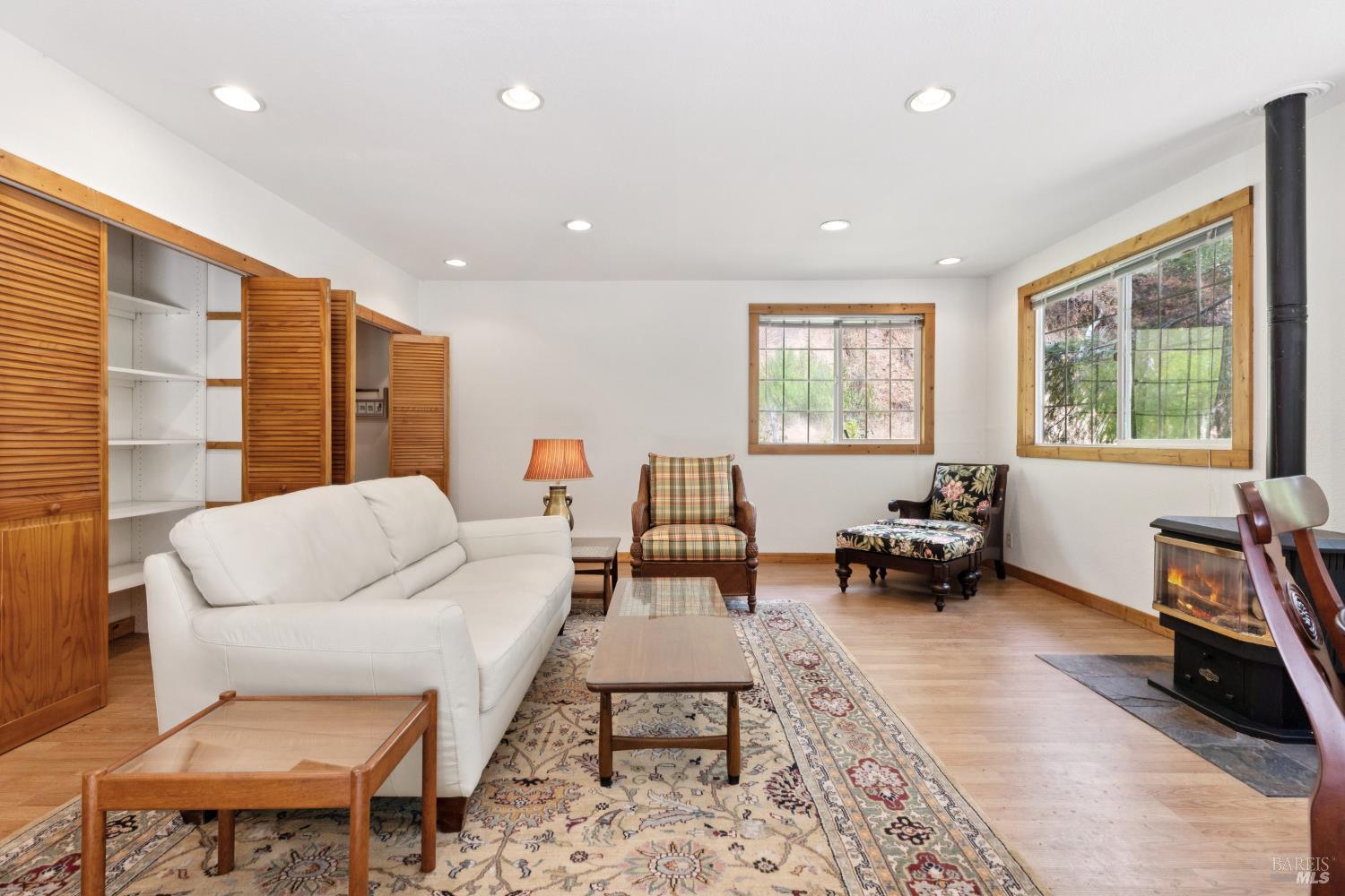 1311 West Dry Creek Road Healdsburg, CA 95448 - Photo 28 of 37 a living room with furniture and a window