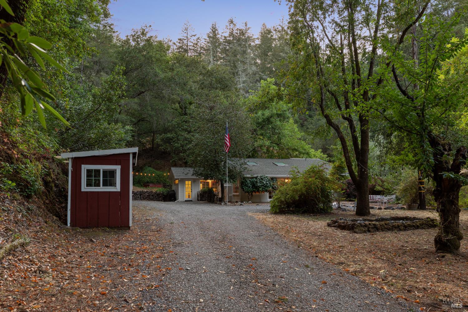 1311 West Dry Creek Road Healdsburg, CA 95448 - Photo 31 of 37 a view of a house with backyard and a tree