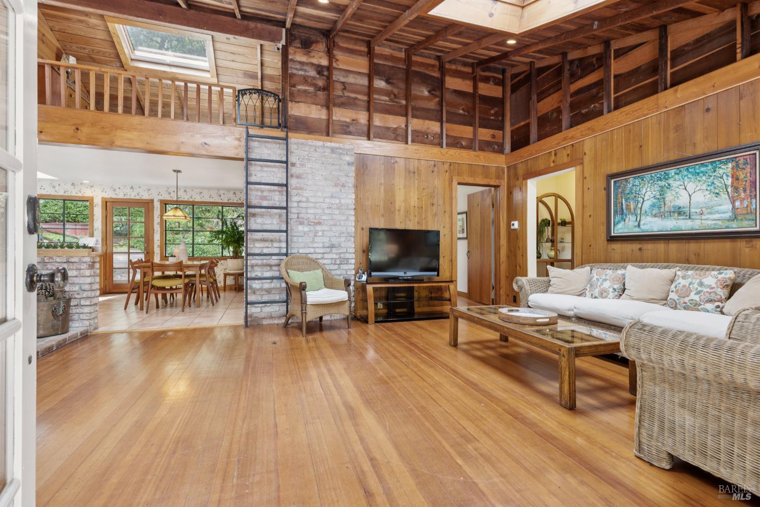 1311 West Dry Creek Road Healdsburg, CA 95448 - Photo 6 of 37 a living room with furniture and a fireplace