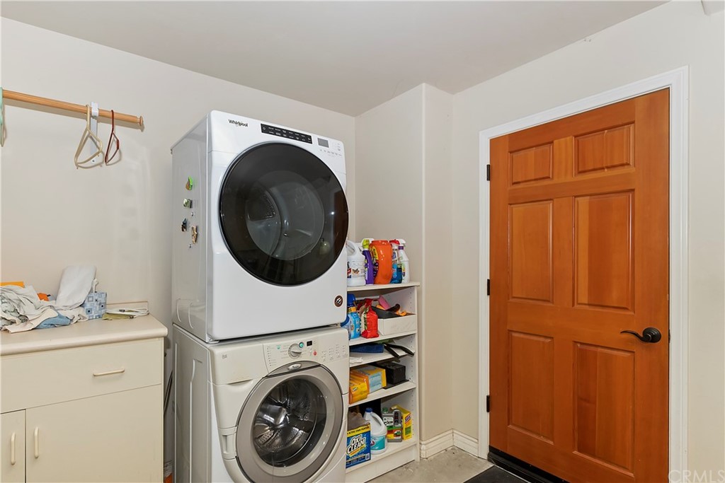 24310 Albrun Drive Crestline, CA 92325 - Photo 14 of 39 a utility room with dryer and washer