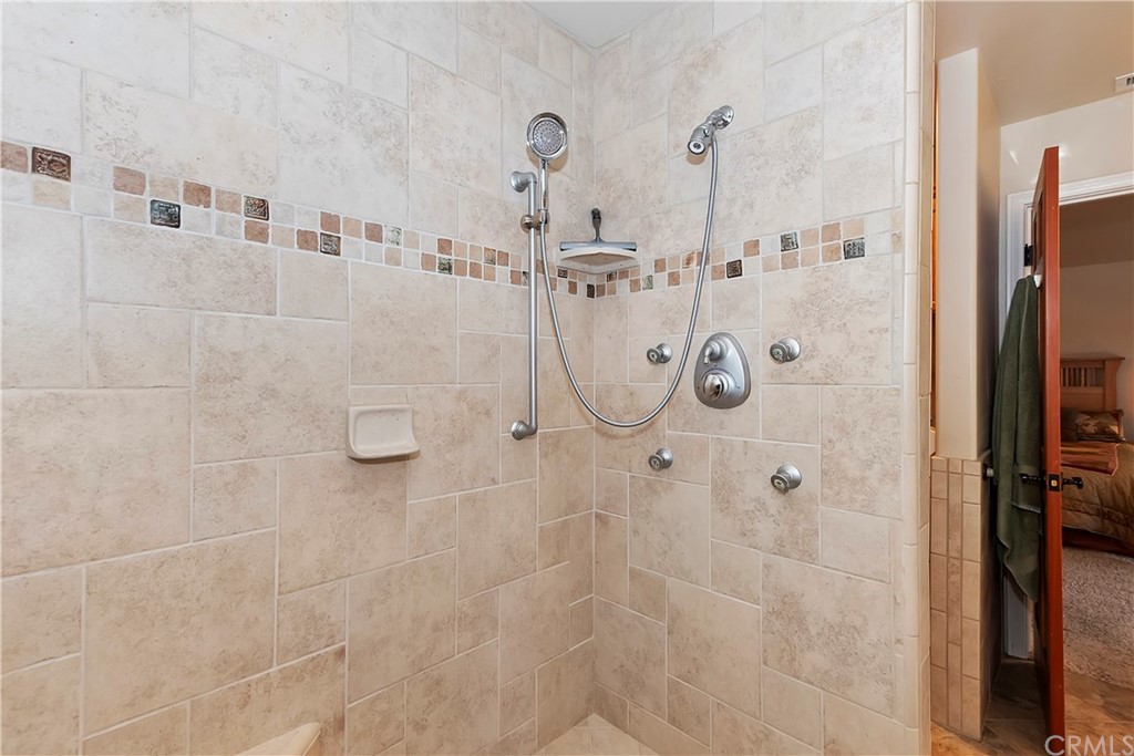 24310 Albrun Drive Crestline, CA 92325 - Photo 20 of 39 a bathroom with a shower