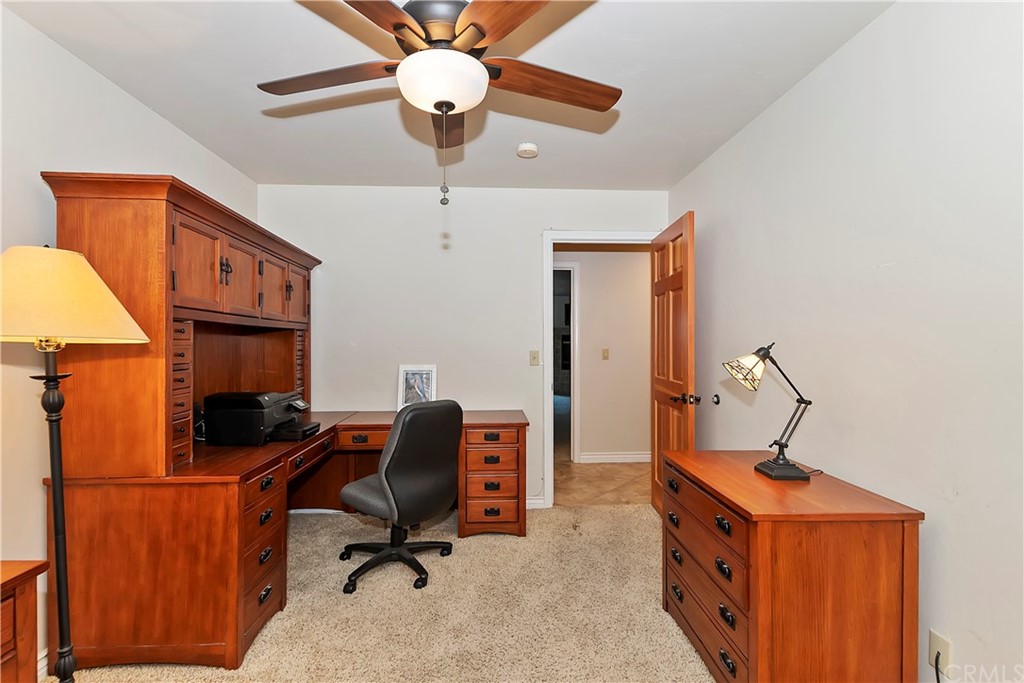 24310 Albrun Drive Crestline, CA 92325 - Photo 25 of 39 a view of workspace with wooden floor windows