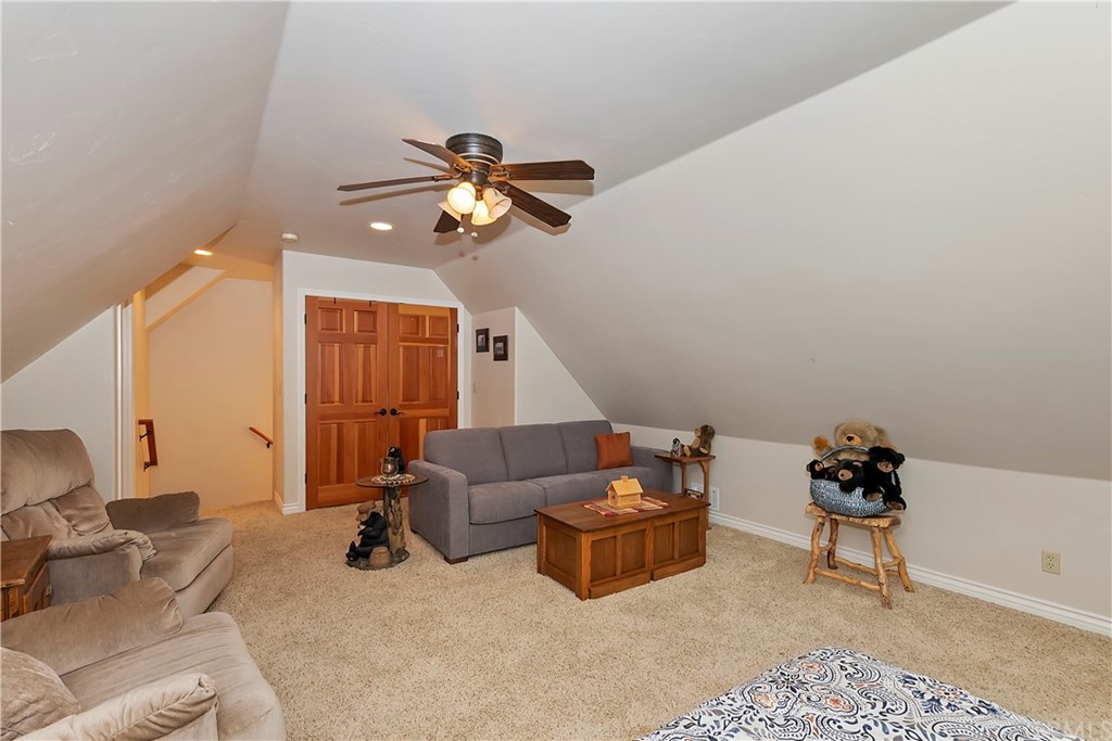 24310 Albrun Drive Crestline, CA 92325 - Photo 27 of 39 a living room with furniture