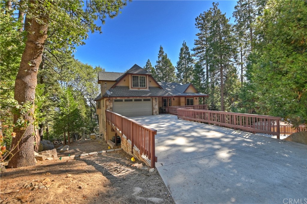 24310 Albrun Drive Crestline, CA 92325 - Photo 37 of 39 a view of a house with a small yard