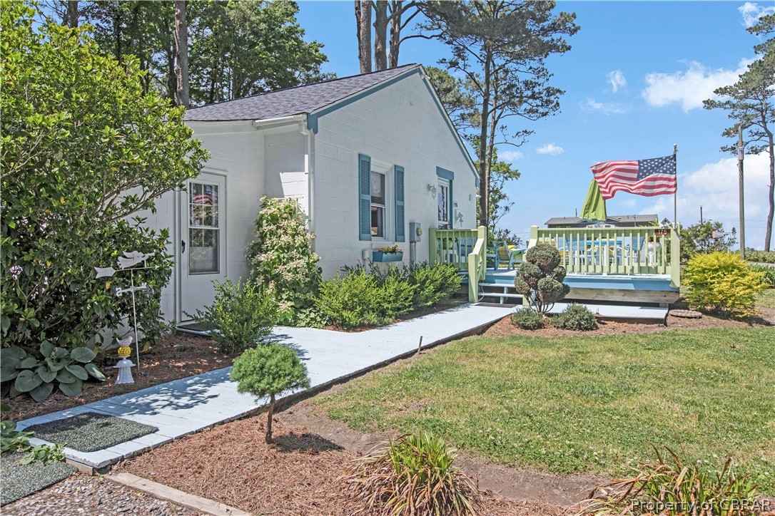 175 Seaside Way Gwynn, VA 23076 - Photo 29 of 48 a front view of a house with garden