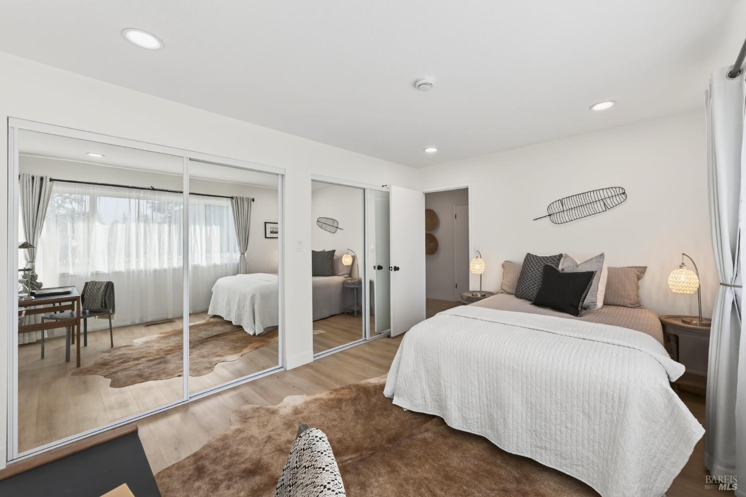 2447 Rigdon Street Napa, CA 94558 - Photo 54 of 79 a bedroom with a bed and a couch