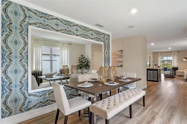 a view of a dining room with furniture