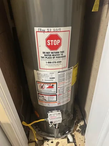a view of a hardwood floor and staircase