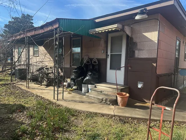 a house view with a outdoor space