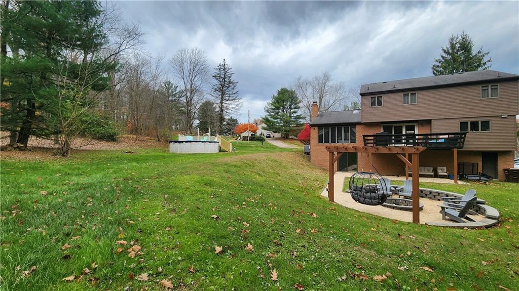 107 Spring Hollow Drive Apollo, PA 15613 - Photo 34 of 40 a view of a house with a yard porch and sitting area