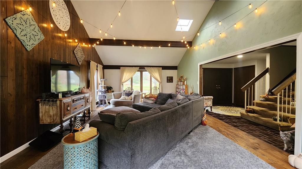 107 Spring Hollow Drive Apollo, PA 15613 - Photo 6 of 40 a living room with furniture fireplace and flat screen tv