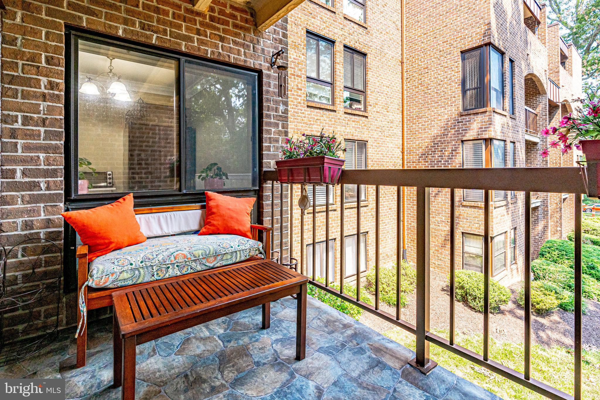 11256 Chestnut Grove Square, Unit 11256142 Reston, VA 20190 - Photo 18 of 31 Relax on the covered patio!
