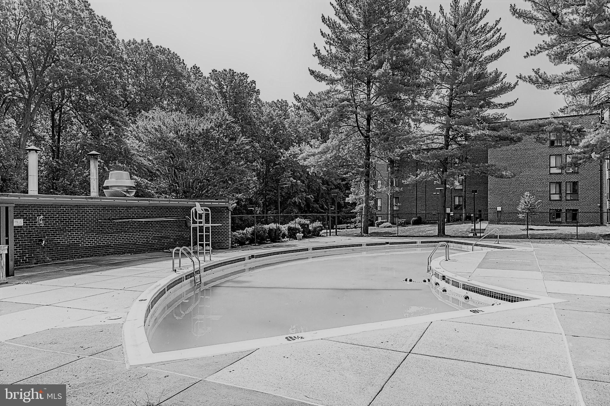 11256 Chestnut Grove Square, Unit 11256142 Reston, VA 20190 - Photo 23 of 31 Pool temporarily closed this season due to COVID
