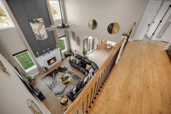 a view of living room with furniture and a window