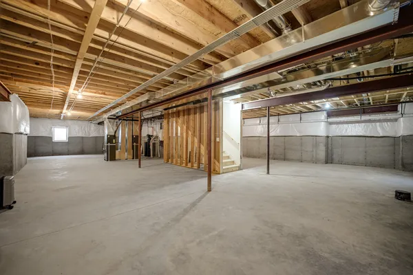 a view of a room with wooden shelves