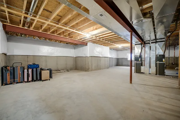 a front view of a house with yard and garage