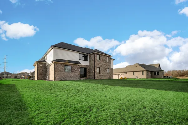 a view of a golf course with a lake