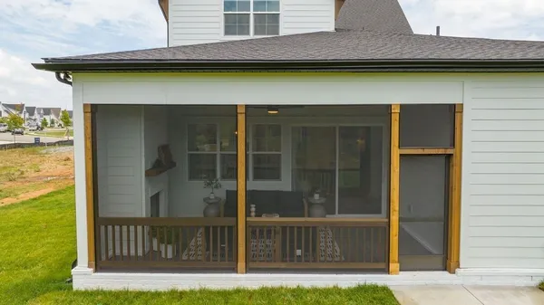 a bathroom with a glass door shower and a sink