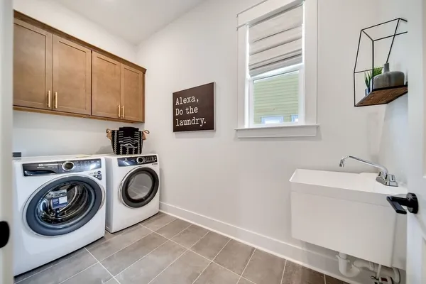a view of a swimming pool with a patio and a yard