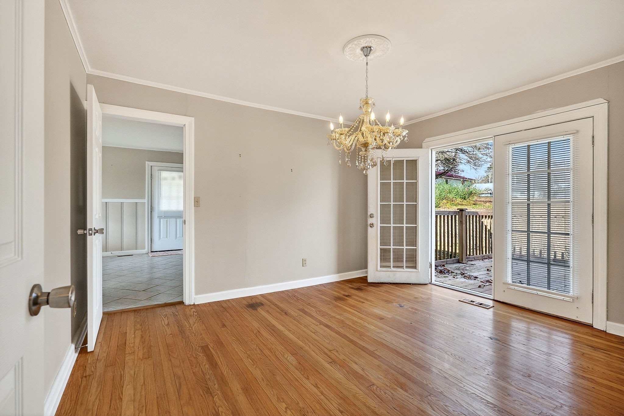 111 Roosevelt Road McMinnville, TN 37110 - Photo 12 of 27 wooden floor in an empty room with a window