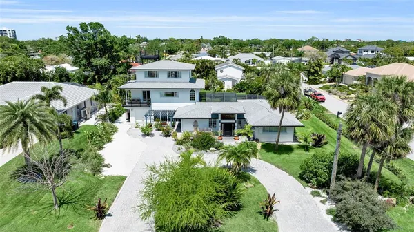 an aerial view of a house with a garden