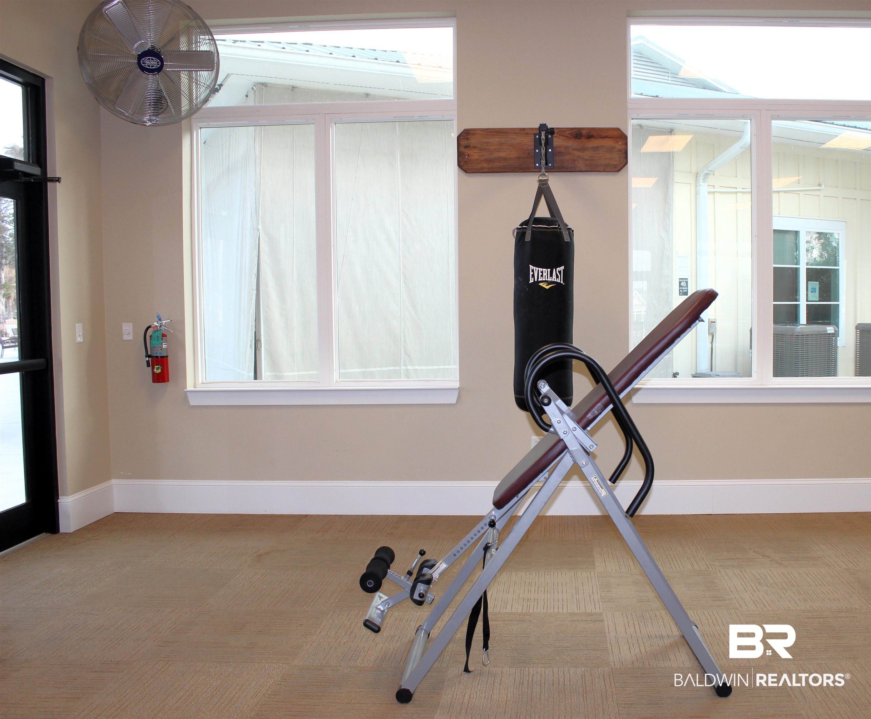 11869 Gateway Drive Elberta, AL 36530 - Photo 24 of 78 Exercise area with carpet flooring and baseboards