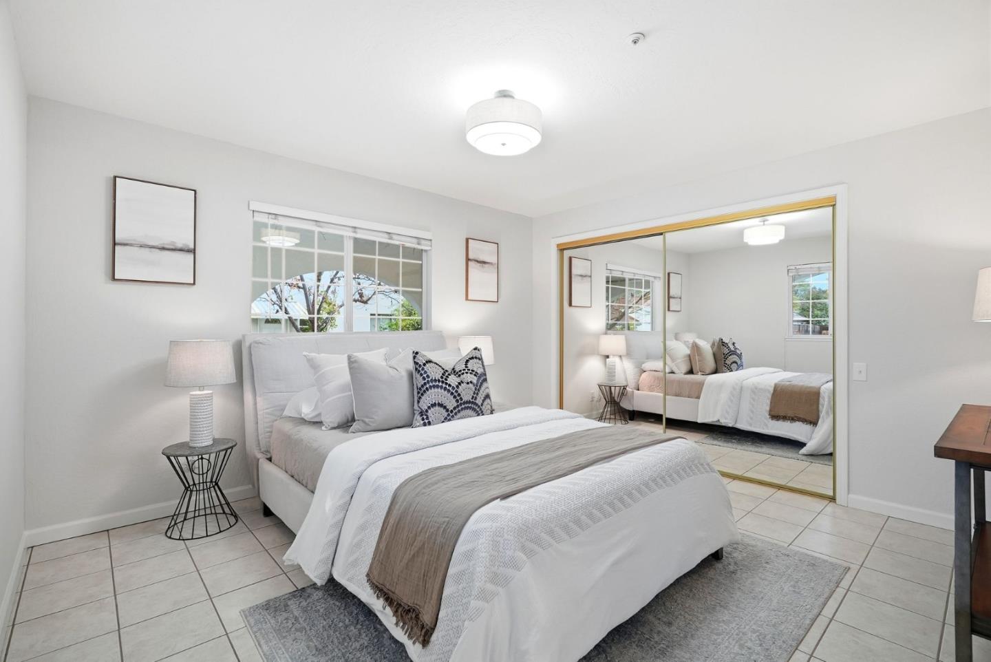 320 Angel Avenue Sunnyvale, CA 94086 - Photo 11 of 47 a bedroom with a bed and window