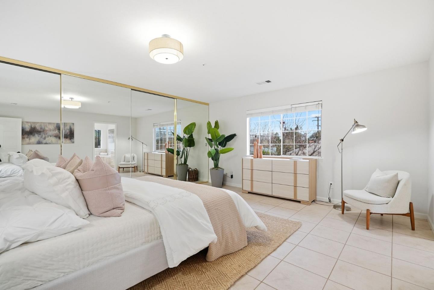 320 Angel Avenue Sunnyvale, CA 94086 - Photo 15 of 47 a bedroom with a large bed and a couch