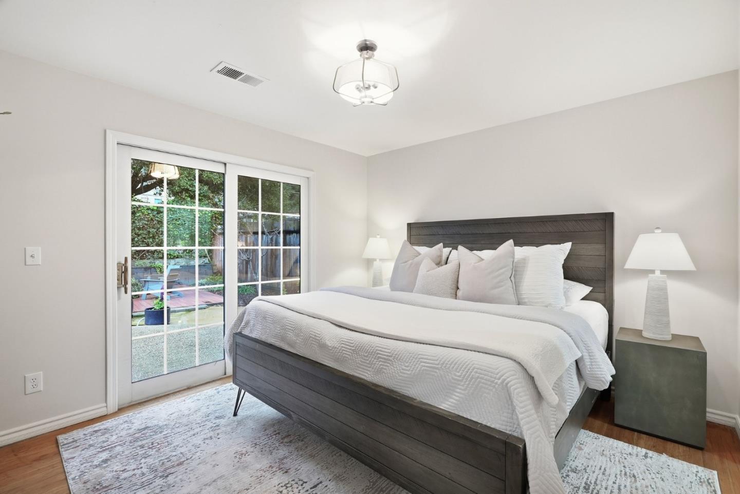 320 Angel Avenue Sunnyvale, CA 94086 - Photo 22 of 47 a large bed sitting in a bedroom next to a window