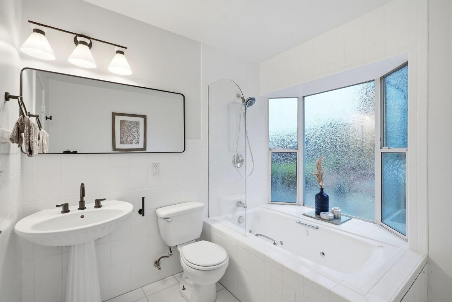 320 Angel Avenue Sunnyvale, CA 94086 - Photo 24 of 47 a bathroom with a sink toilet and shower