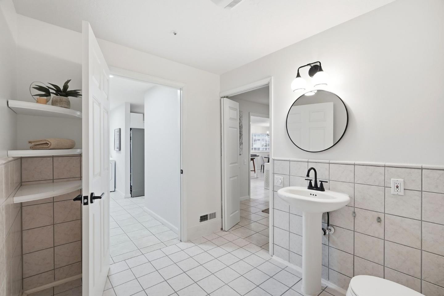 320 Angel Avenue Sunnyvale, CA 94086 - Photo 31 of 47 a bathroom with a sink toilet and a mirror
