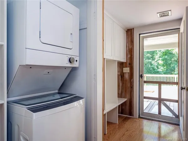 a utility room with washer and dryer