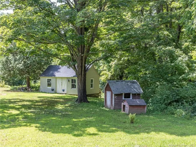 a house view with a garden space