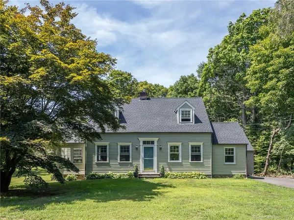 front front view of a house with a garden
