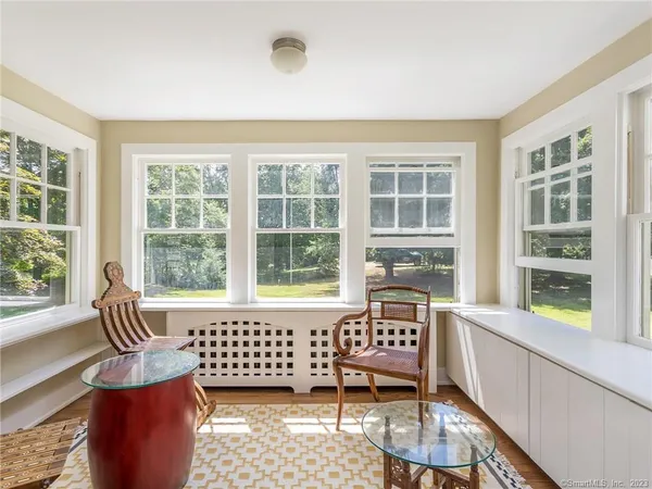 a view of a room with a large window