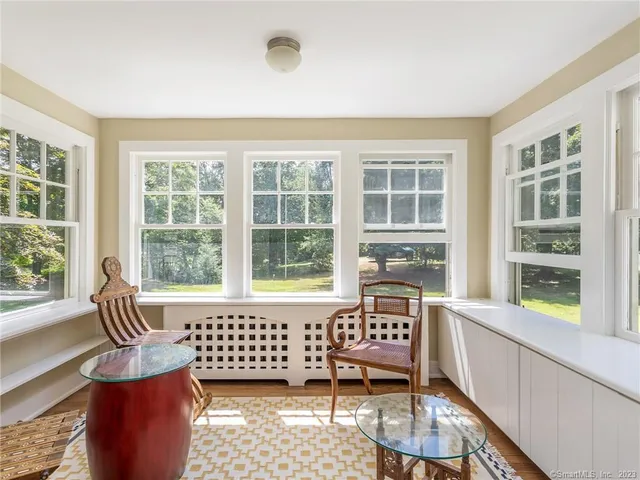 a view of a room with a large window