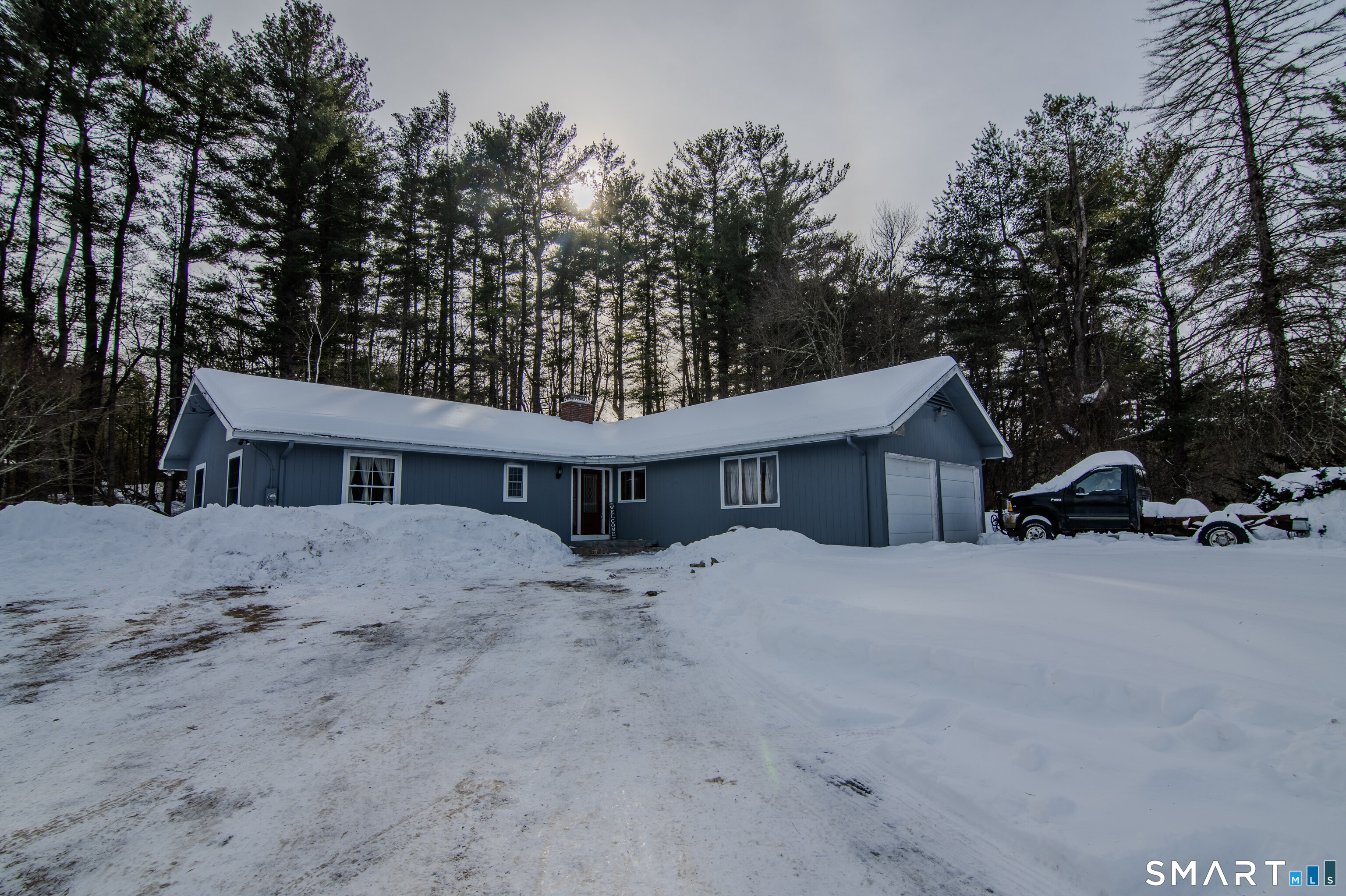 310 Roseland Park Road Woodstock, CT 06281 - Photo 14 of 43 a view of a house with a yard