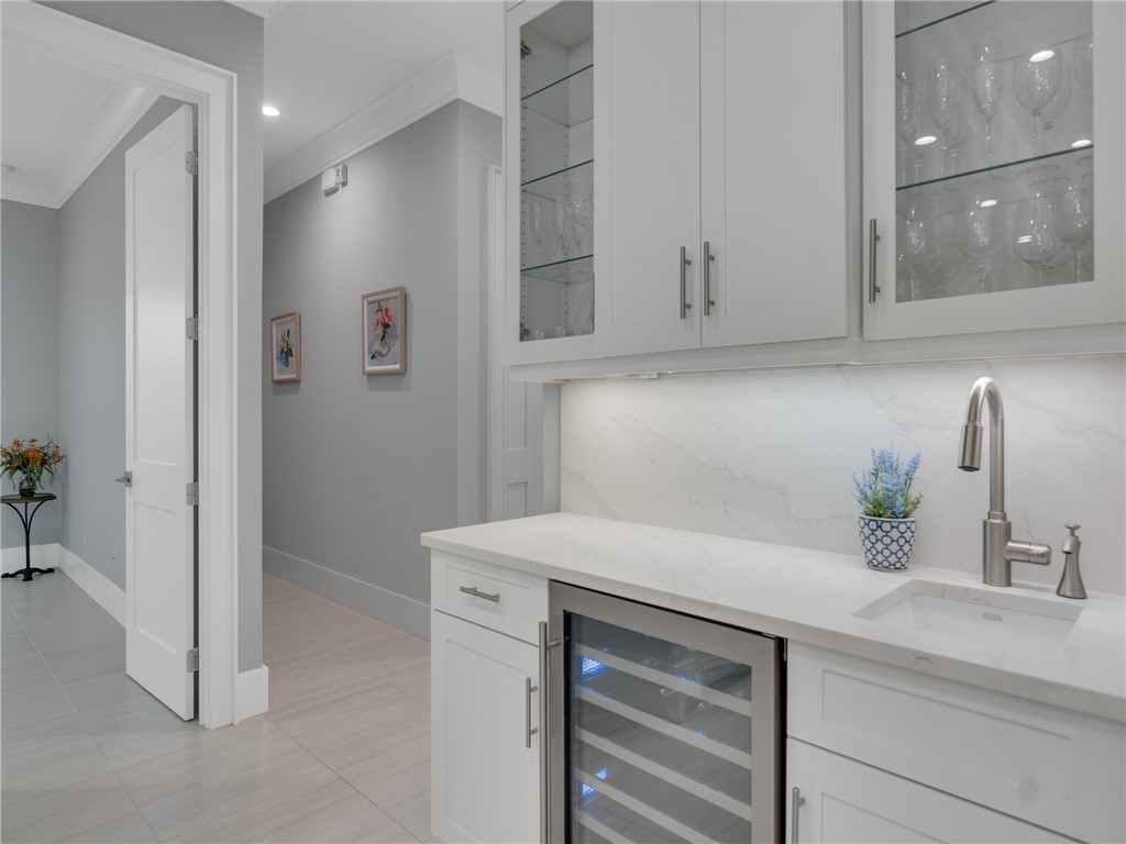1025 Andarella Way Vero Beach, FL 32963 - Photo 21 of 36 a bathroom with a sink and a mirror