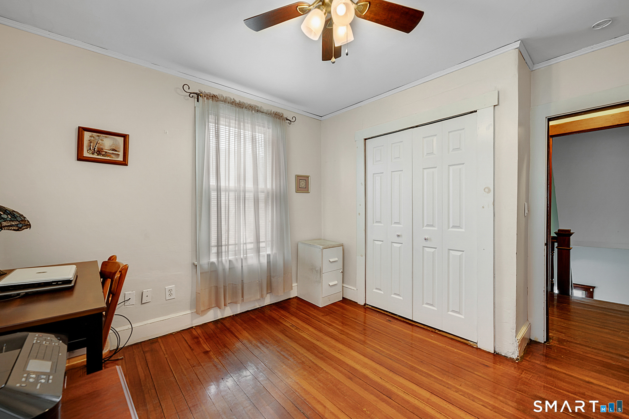 412 Reservoir Avenue Meriden, CT 06451 - Photo 16 of 32 a view of room with hardwood floor and ceiling fan