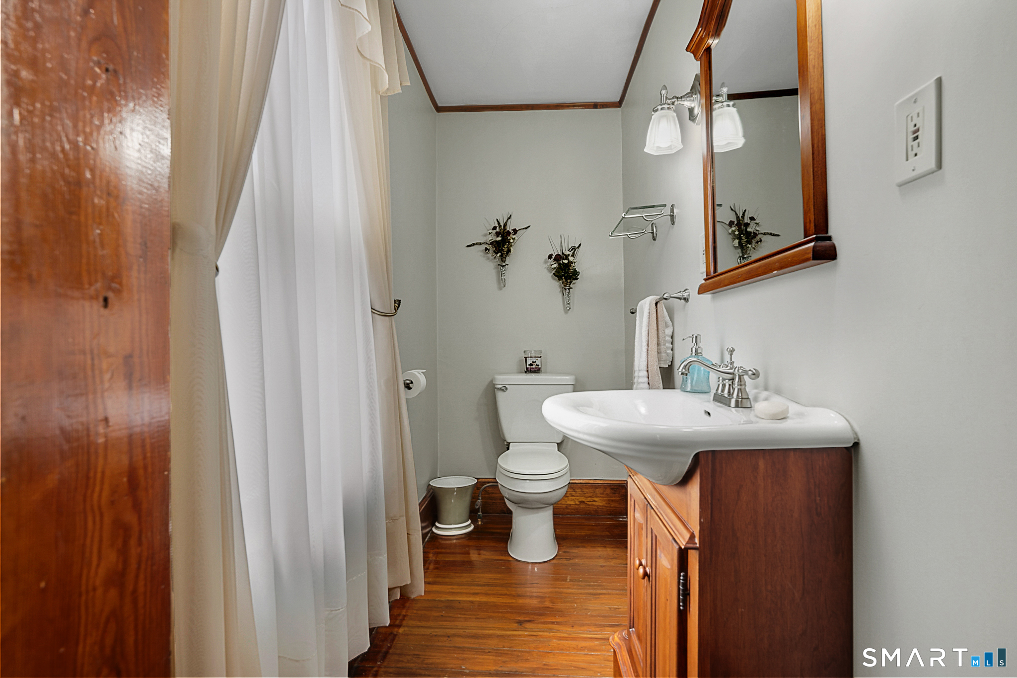 412 Reservoir Avenue Meriden, CT 06451 - Photo 22 of 32 a bathroom with a sink and toilet