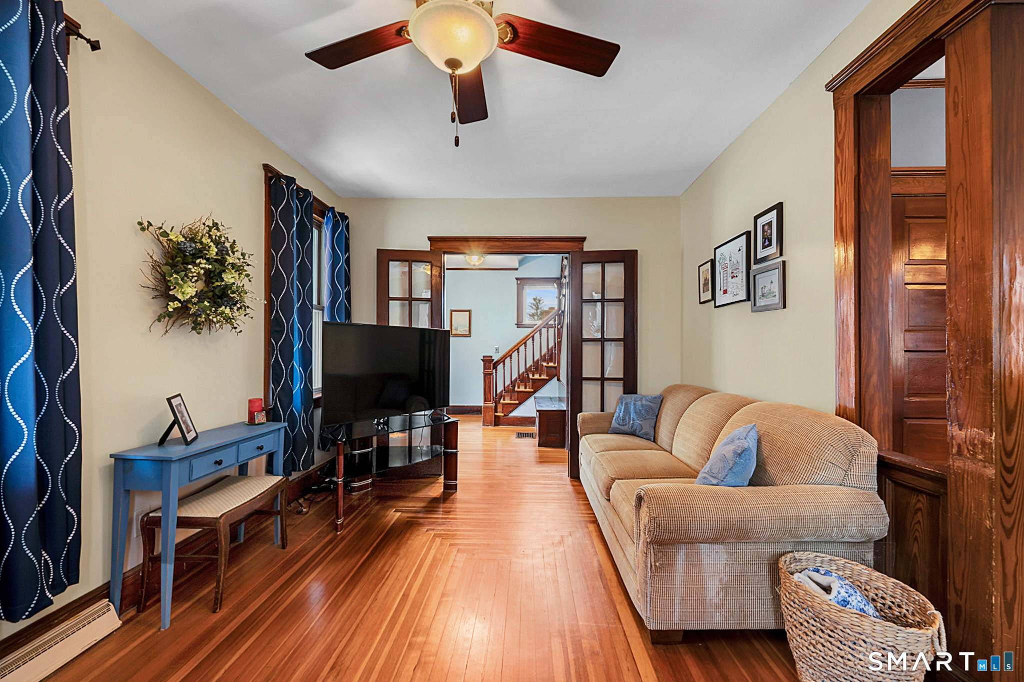 412 Reservoir Avenue Meriden, CT 06451 - Photo 6 of 32 a living room with furniture and a flat screen tv