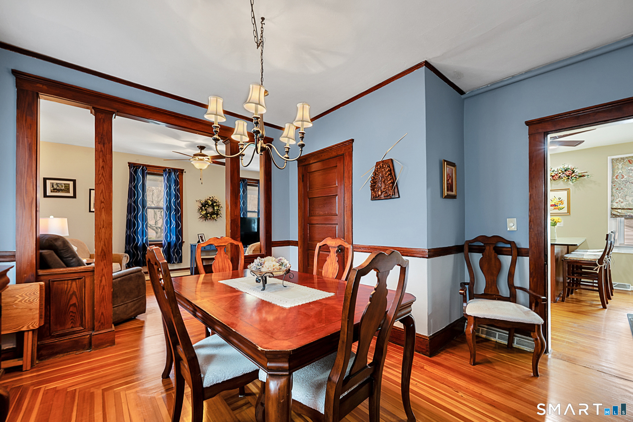 412 Reservoir Avenue Meriden, CT 06451 - Photo 8 of 32 a view of a dining room with furniture window and wooden floor